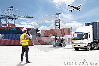 Foreman control loading Containers box Stock Photo