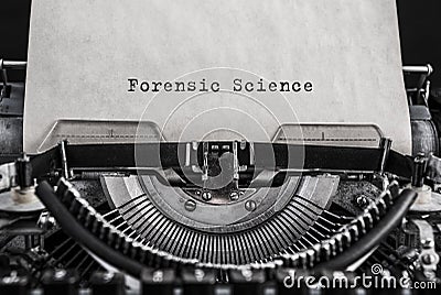 Forensic Science words typed on vintage typewriter. Stock Photo