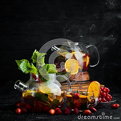 Forest berry and fruit tea. Hot winter drinks. Stock Photo