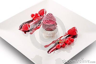 Forest fruit ice cream with fresh fruit on white plate, exclusive summer dessert, patisserie Stock Photo