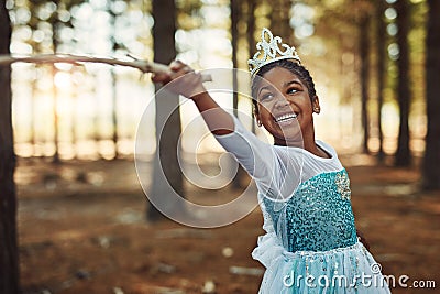 Forest, princess costume and girl with stick for playing fantasy, childhood games and happiness. Nature, fairy tale and Stock Photo