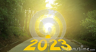 Word 2023 written on forested rural road Stock Photo