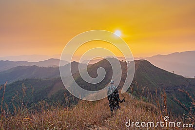Forester or forest ranger hiking in the mountains at Khao Chang Puak mountain Thailand Editorial Stock Photo