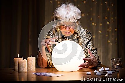 Foretelling future from crystal ball Stock Photo