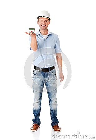 A forewoman holding a model house Stock Photo