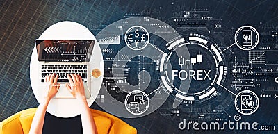 Forex trading concept with person using a laptop Stock Photo