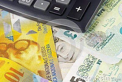 Forex - UK and Swiss currency Editorial Stock Photo