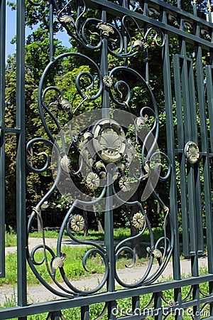 Forged fence with a beautiful ornament Stock Photo