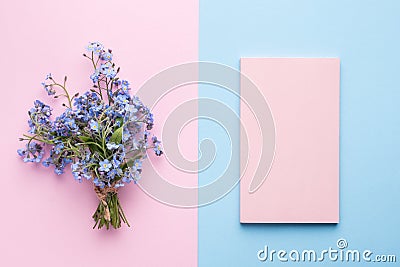 Forget me not flowers bouquet on pink pastel background Stock Photo