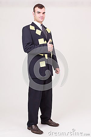 Forgetful businessman with sticky notes Stock Photo