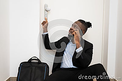 Forgot Key Sitting At Front Door Stock Photo