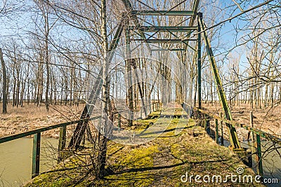 Forgotten drawbridge over a river Stock Photo