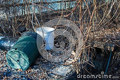 Forgotten Plant Pots On a Table in an Abandoned Greenhouse Full of Dead Vines Stock Photo