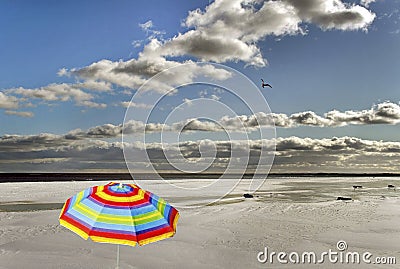 Forgotten umbrella in a winter. Stock Photo