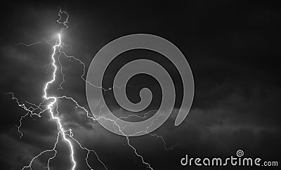 Fork lightning striking down during summer storm Stock Photo