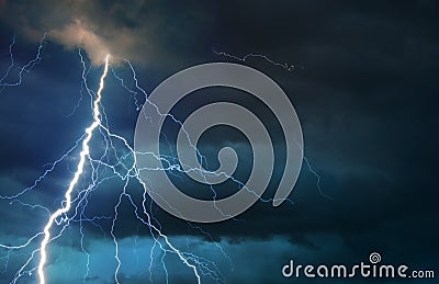 Fork lightning striking during summer storm Stock Photo