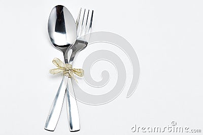 Fork and spoon with ribbon Stock Photo