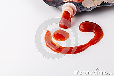 Fork stained tomato ketshup on table with dish Stock Photo