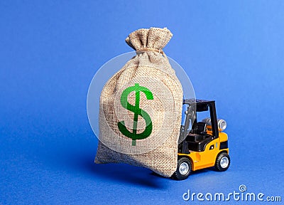 Forklift carries a huge money bag with the symbol of US dollar. Budget and taxpayer funds. Investment and capital migration Stock Photo