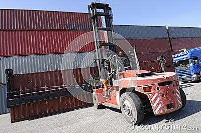 Forklift, container and truck Stock Photo