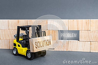 Forklift Intends to Insert block Solution into void Problem. Correction of errors and repair, search for the best resolution Stock Photo