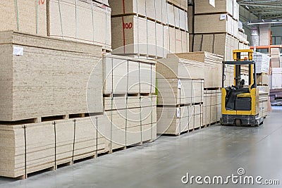 forklift loader pallet Building materials warehouse, logistics concept, construction of houses, loader. Stock Photo