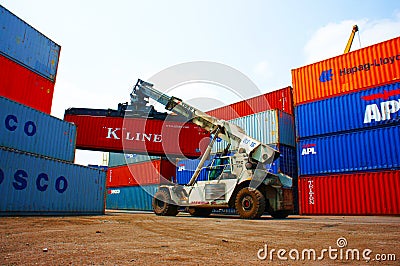 Forklift truck, container, Vietnam freight depot Editorial Stock Photo