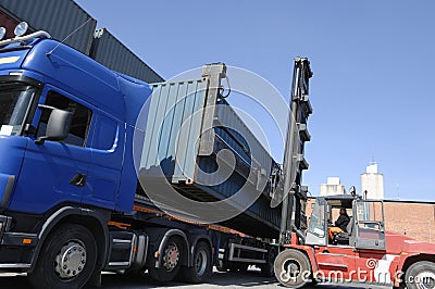 Forklift, truck and containers Stock Photo