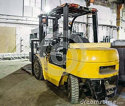 Forklift Truck inside warehouse or factory Stock Photo