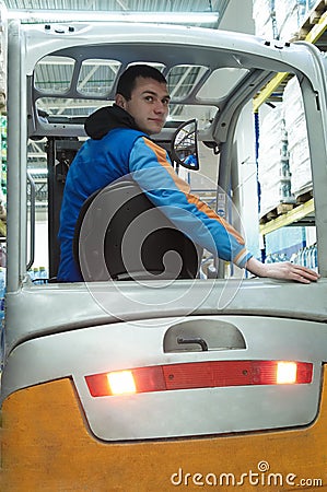 Forklift worker at warehouse Stock Photo