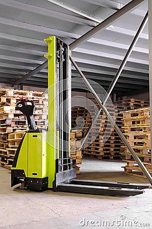 Forklifter stacker in warehouse Stock Photo