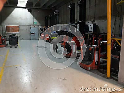 Forklifts in Warehouse Editorial Stock Photo
