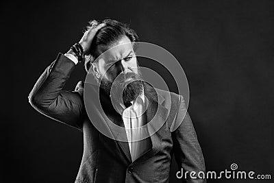 formal fashion model. handsome man on gray background. serious bearded businessman. stylish mature man looking modern Stock Photo