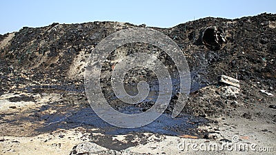 Former dump toxic waste, oil lagoon contamination, nature effects from soil Stock Photo