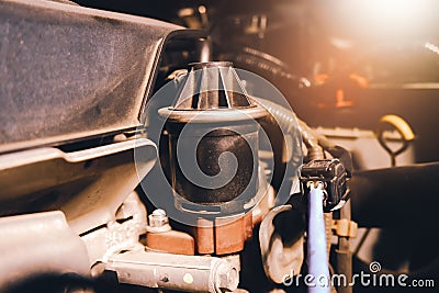 The former exhaust gas recirculation system EGR in the engine compartment, which helped to minimize carbon monoxide gas Stock Photo