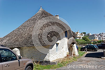 Thatched cottage at Hope Cove Devon England. Editorial Stock Photo