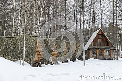 Former tourist camp in the countryside with a wooden dwelling Stock Photo