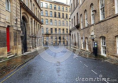 Former Victorian stone warehouses, on Vicar Lane, Little Germany, Bradford, UK Stock Photo