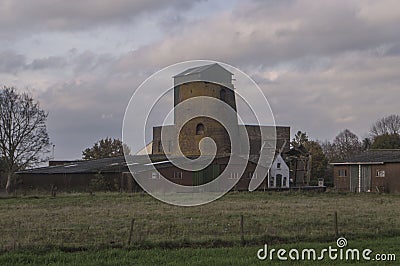 Former windmill in little village Beek Stock Photo