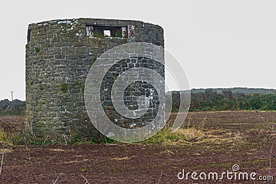 WWII defended building that is former windmill. Stock Photo