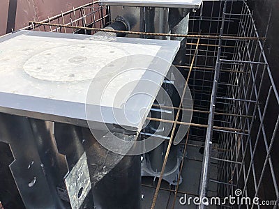 Formwork and reinforcement of road bollard foundation Stock Photo