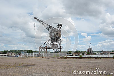 Forsaken crane on port Stock Photo