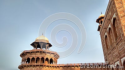 The fort made of red stone and the artwork on the wall. Historical palace Stock Photo