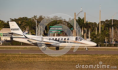 FORT MYERS 15 FEB 2024. 1991 CESSNA 560 taxis on the runway at Page Field Airport in Fort Myers on the Gulf Coast. Florida, USA Editorial Stock Photo