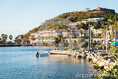 Fort St. Louis in Marigot with coastal hotels of foreground Editorial Stock Photo