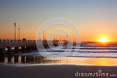 Forte dei marmi's pier with people admiring sunset Stock Photo