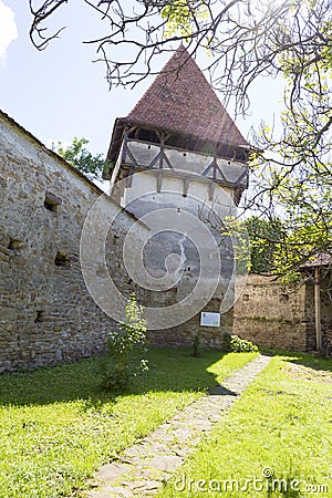 Fortification wall and tower from the fortified church of Cincsor village Stock Photo