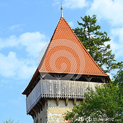 Fortified medieval saxon evangelic church in the village Cata, Transylvania, Romania. Stock Photo