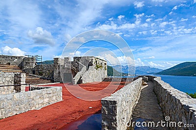 Fortress Kanli Kula (Bloody Tower) on background of bay, Herceg Stock Photo