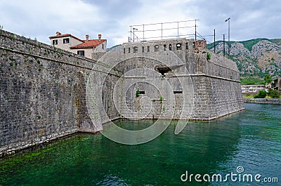 Fortress wall of bastion Bembo near river Shkurda, Kotor, Montenegro Stock Photo